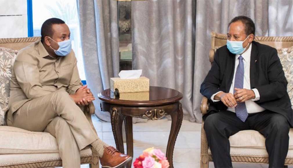 PM Abiy Ahmed (L) and PM Abdalla Hamdok (R)